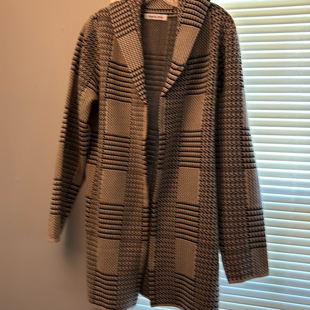 Selling a light coat never worn